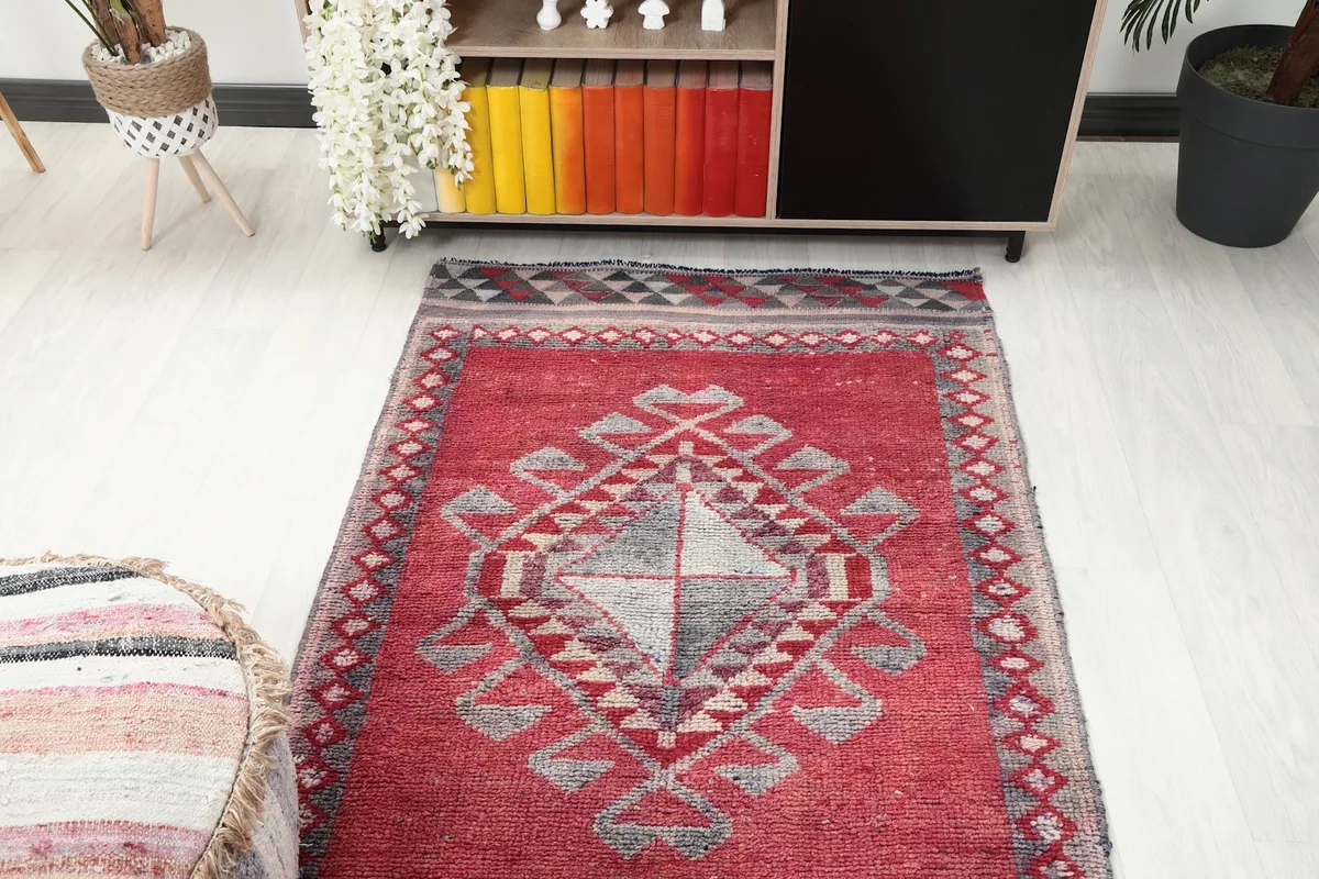 View of the runner rug from above, placed in a room, emphasizing its length and pattern flow.