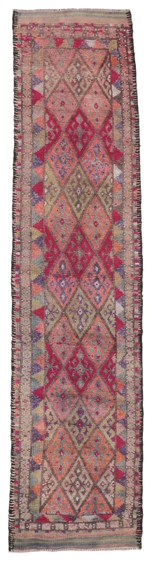Full overhead view of the 2'11" x 13'0" vintage Anatolian runner rug with red and rust geometric patterns