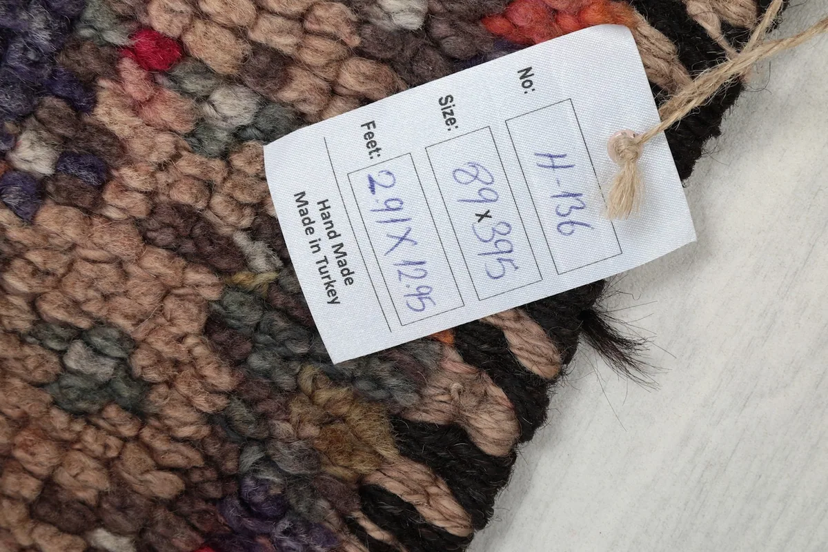 Product tag displaying the rug's dimensions (89 x 395 cm, 2'11" x 13'0") and origin: Hand Made in Turkey