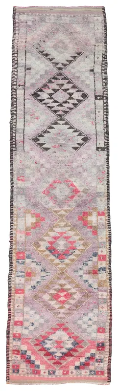 Full top view of the vintage Anatolian runner rug with rose and multicolor geometric patterns