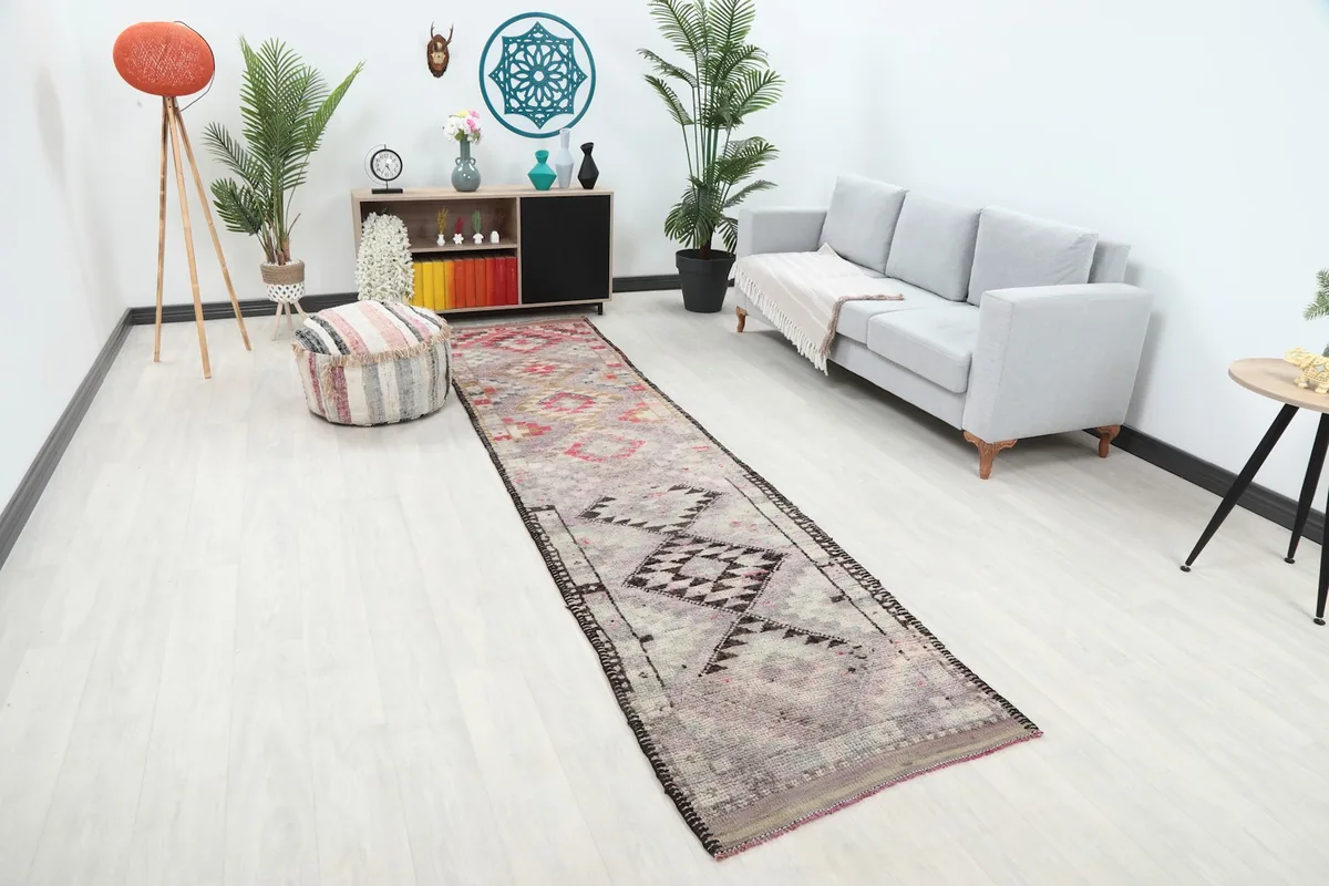 Angled view of the runner rug extending through a living space
