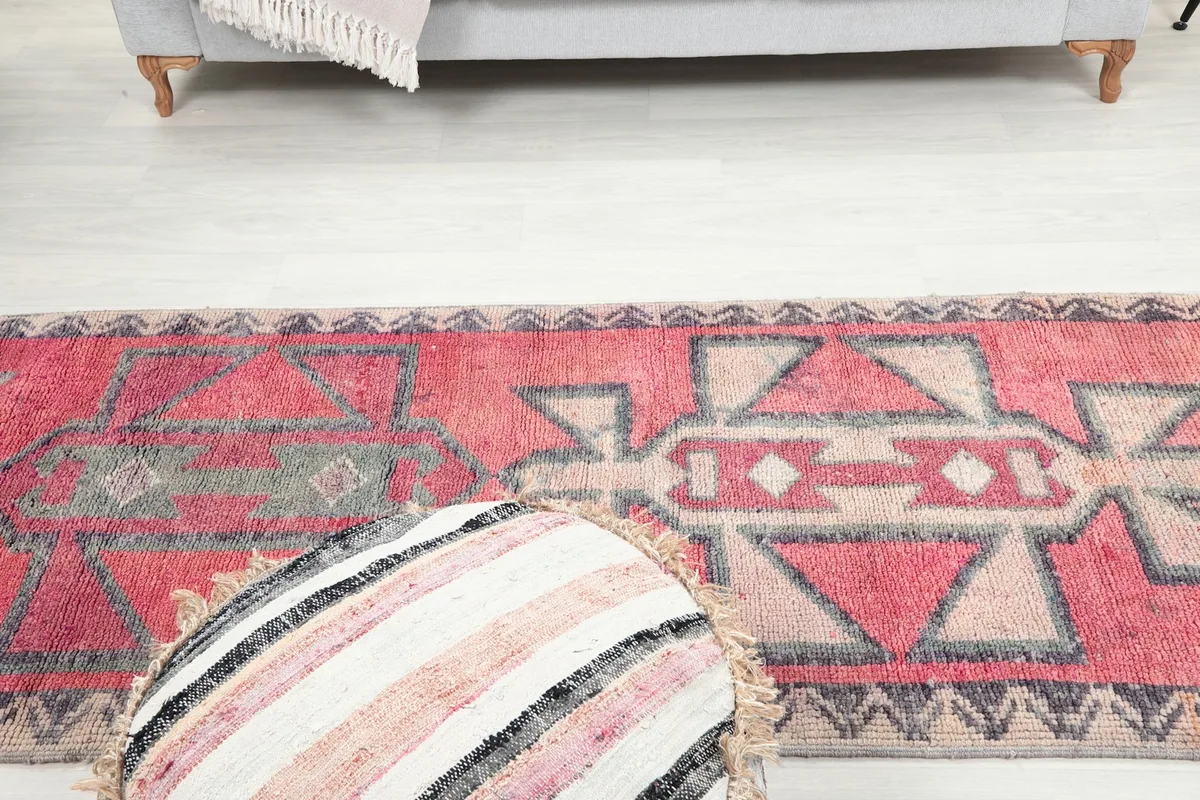 Wide shot of the runner rug on the floor, showcasing its full length and pattern