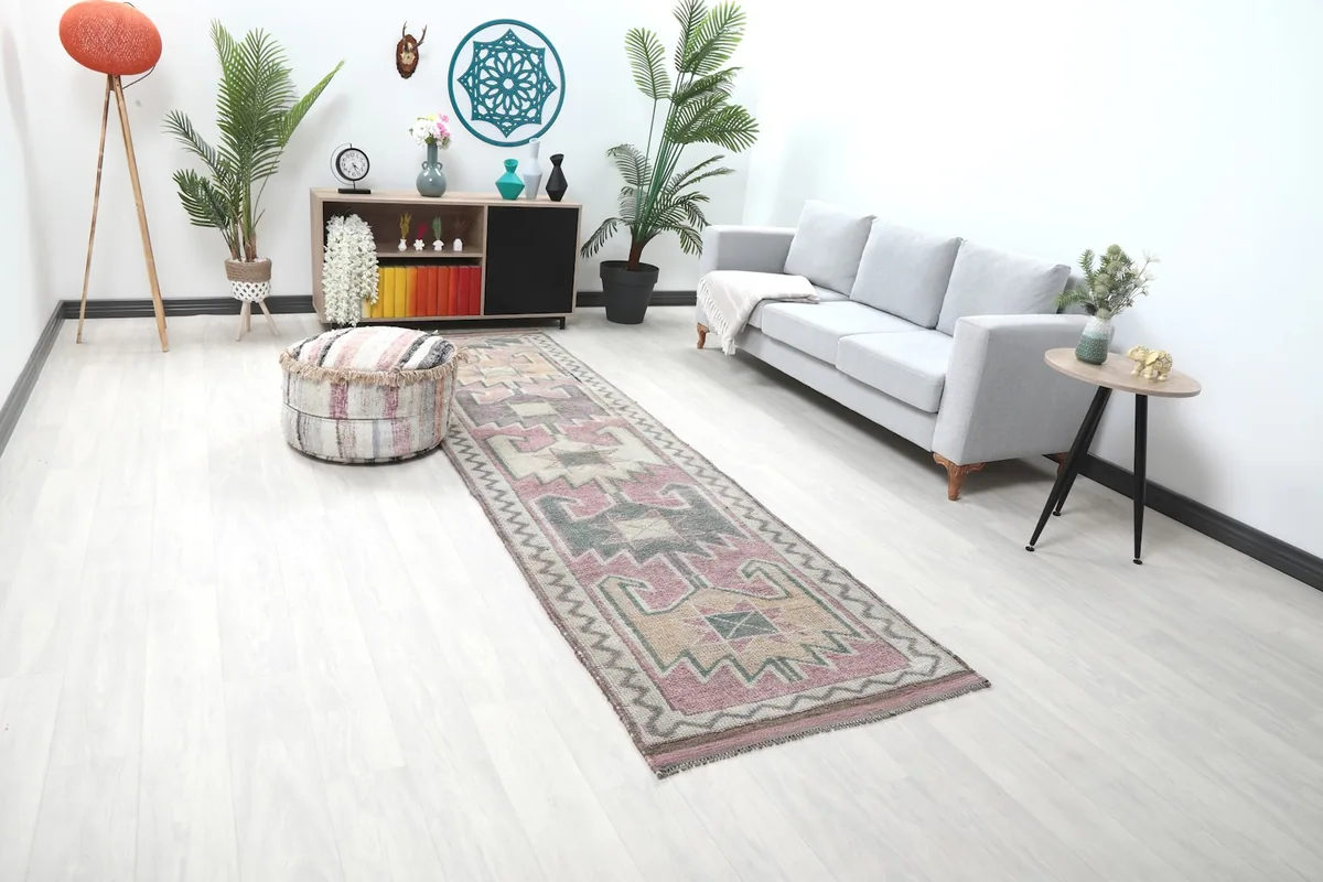 Angle view of the runner in a room, highlighting its colors and how it fits the space