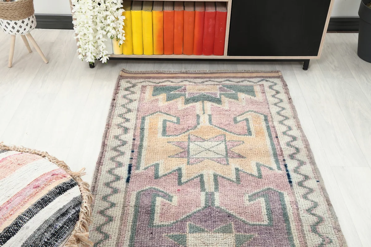 Overhead view of a section of the runner, emphasizing the central pattern against furniture