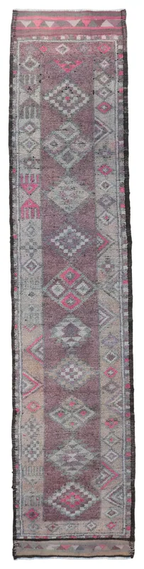 Full overhead view of the 2'9" x 12'11" vintage Anatolian runner rug on a white background.