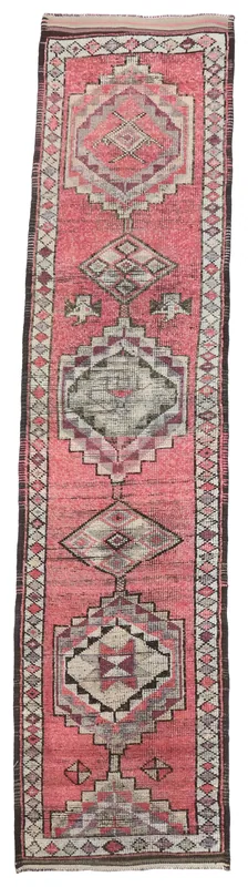 Full overhead view of the rose and gray geometric Anatolian runner rug