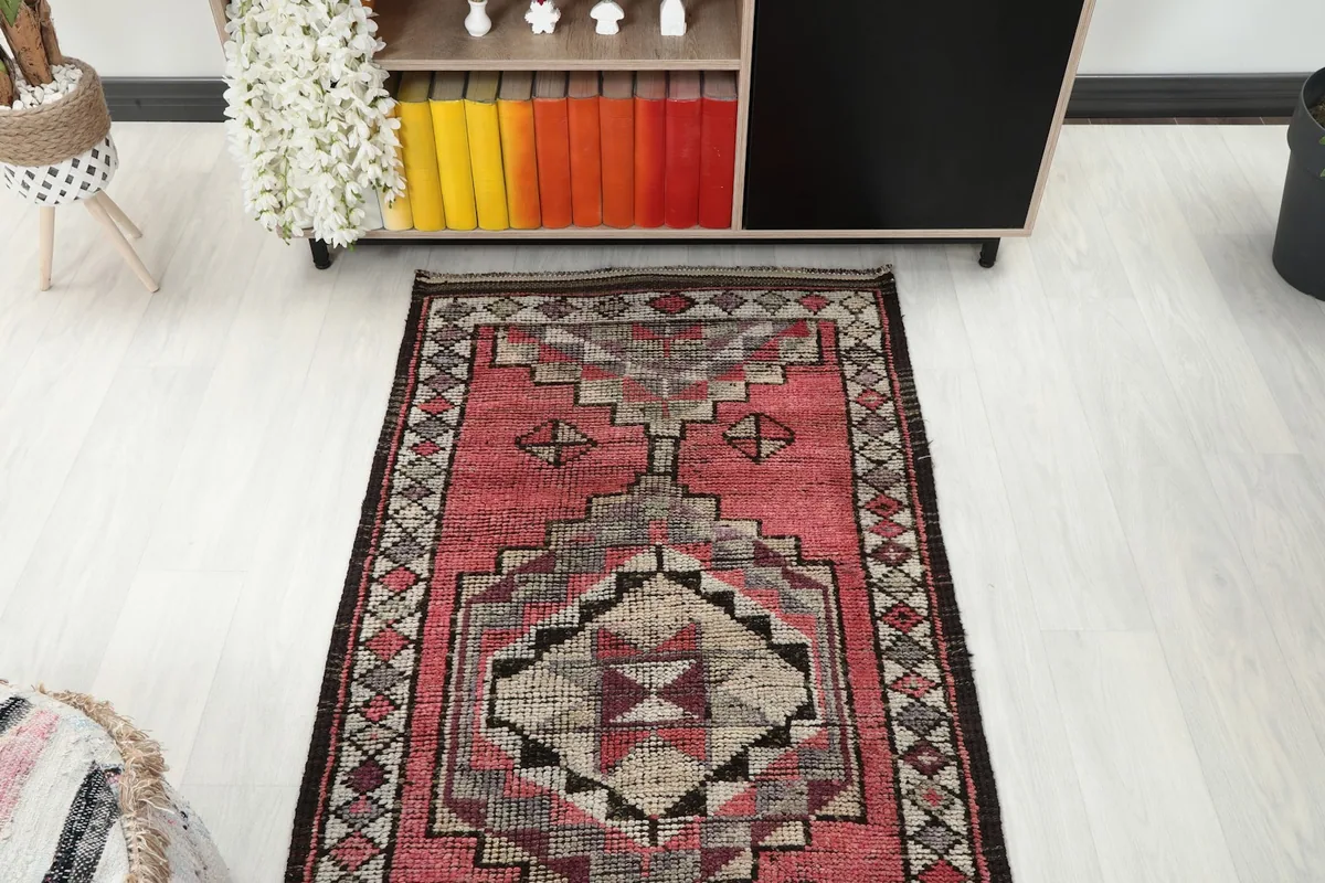 Overhead view of a section of the runner rug in a room setting