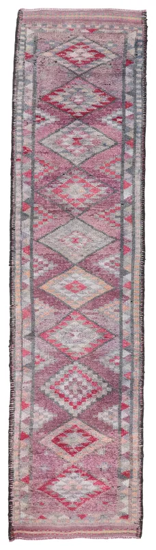 Full overhead view of the 2'11" x 11'10" rose and gray geometric tribal runner rug on a white background.