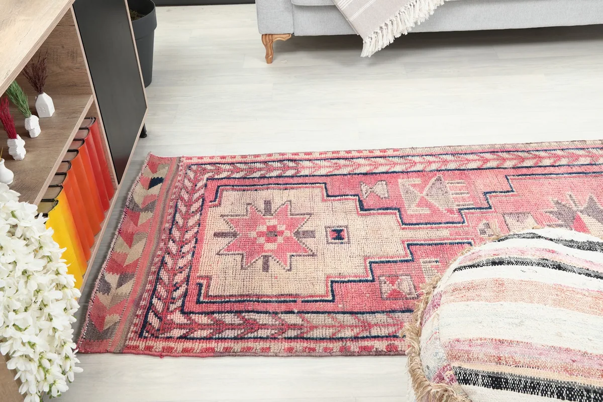 Runner rug extending through a room, showing its length and how it complements the decor