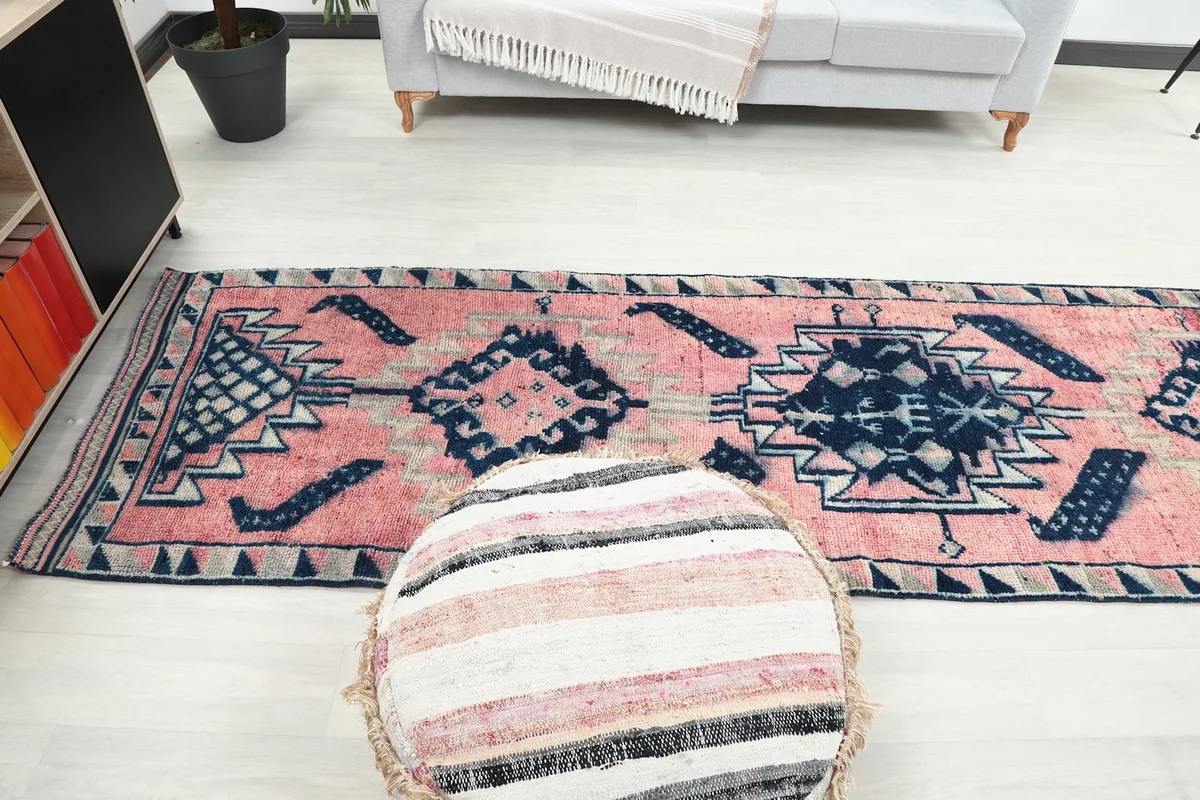 View of the runner rug extending down a hallway, demonstrating its suitability for long spaces
