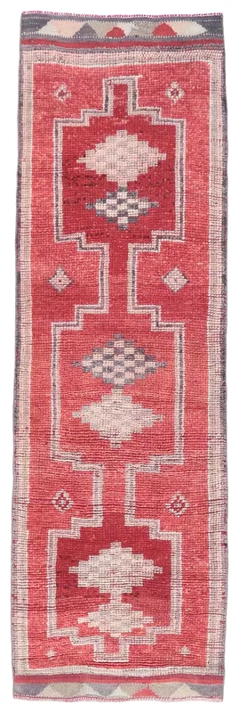 Full overhead view of the red and gray geometric vintage Anatolian runner rug
