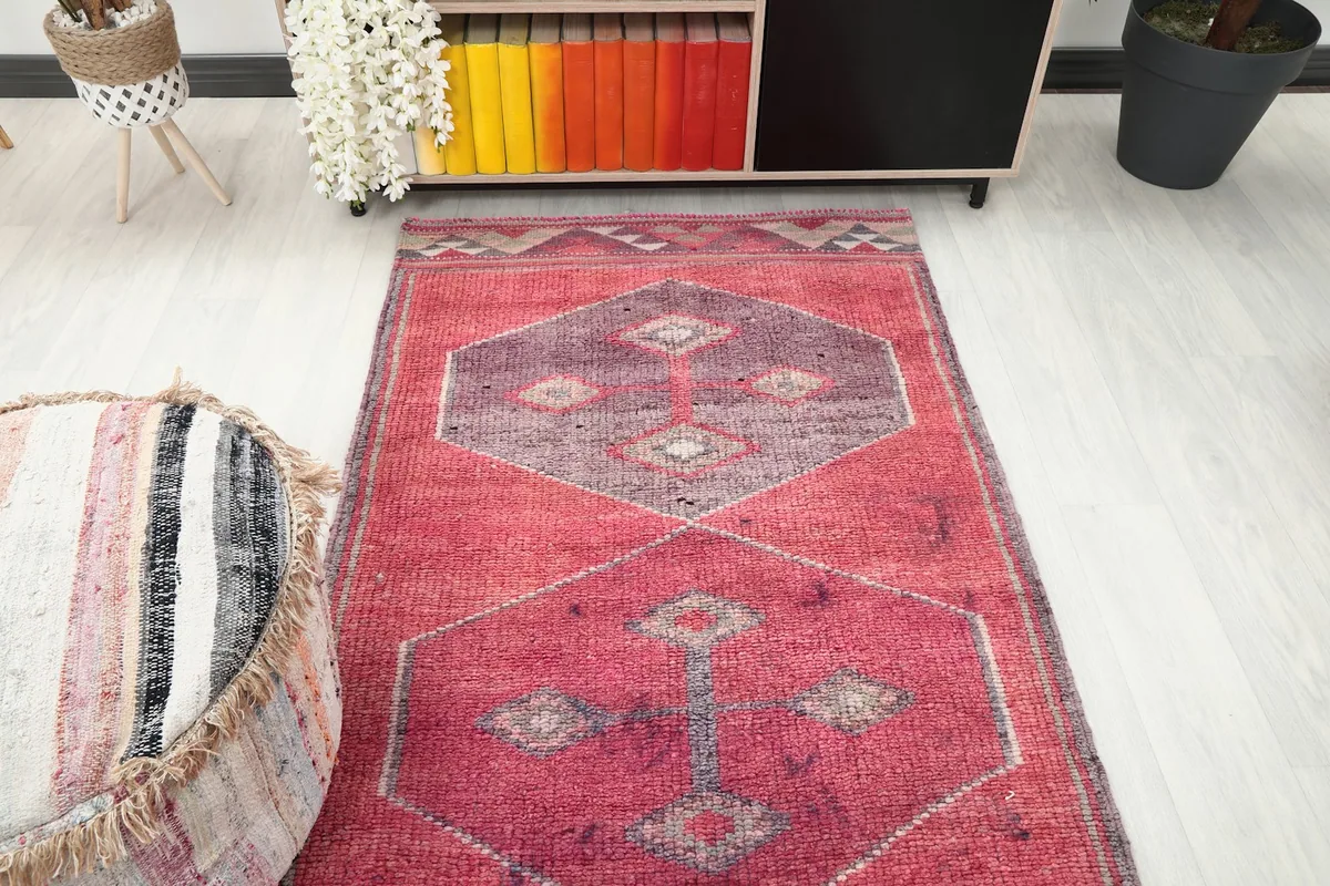 Overhead view of the runner rug placed in a hallway, showing its proportion in the space.