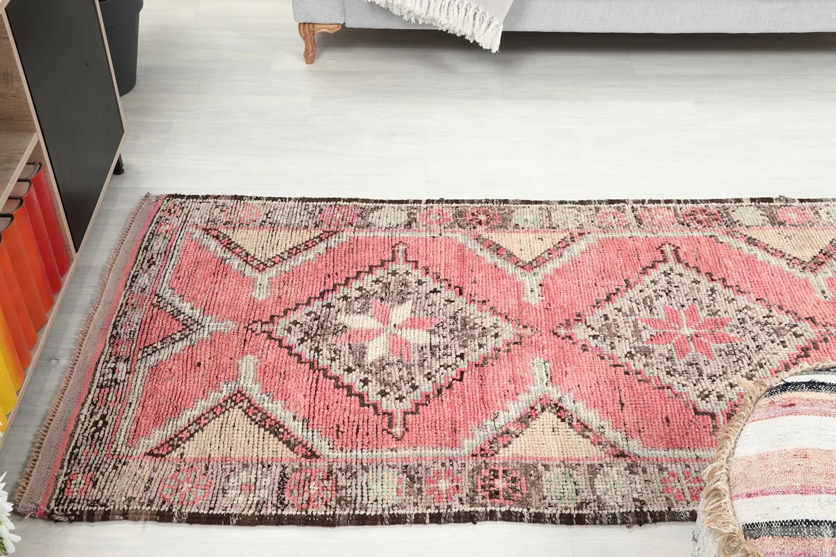 Wider room shot of the runner, emphasizing its presence and how it complements the light flooring