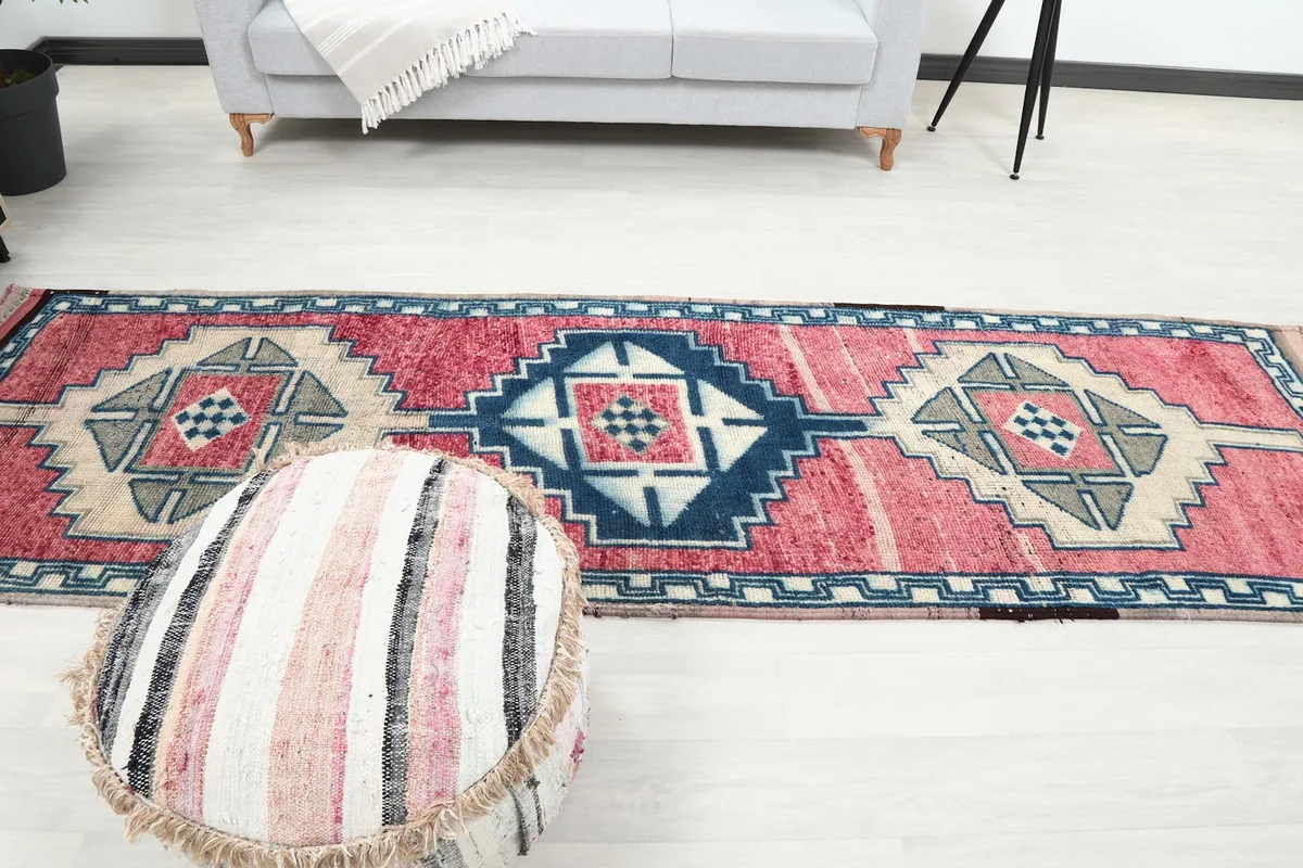 Full length view of the runner rug in a room, showing its impact on the space.