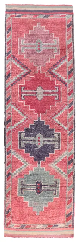 Full top view of the 3'2" x 10'9" rose geometric Anatolian runner rug on a white background