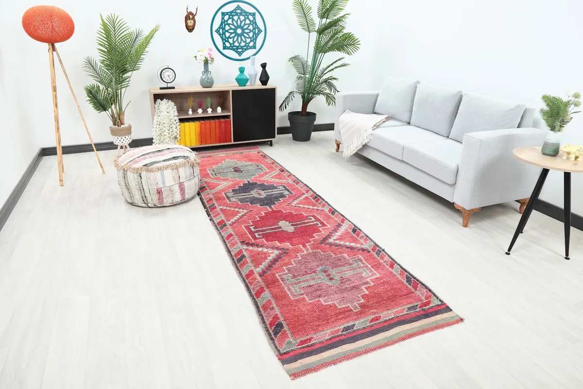Angle view of the rose runner rug in a living room, showing its texture and how it complements the space