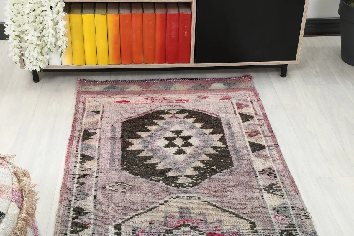 Overhead view showing the top section of the runner rug in a room
