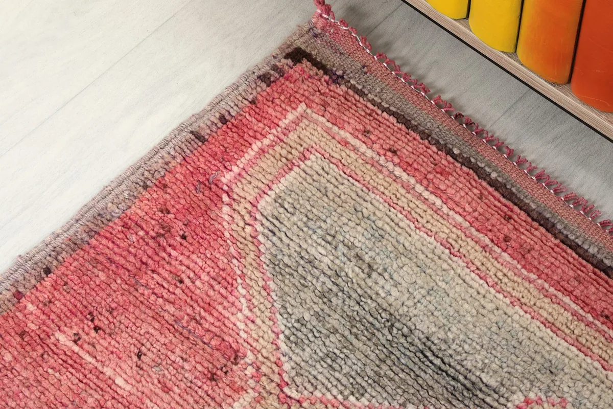 Close-up of the runner's border and end, revealing the subtle color variations and wear