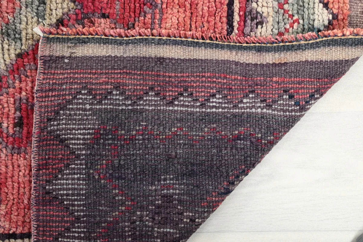 Close-up of the back of the rug, revealing the knot structure and craftsmanship