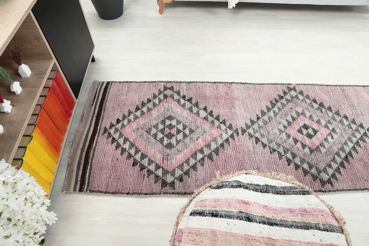 Overhead perspective of the runner rug's length and pattern in a room setting