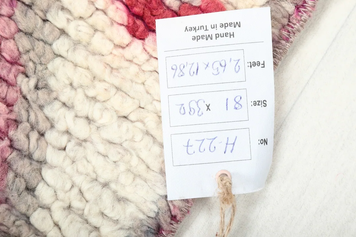Product tag on the rug, indicating its size and origin from Turkey