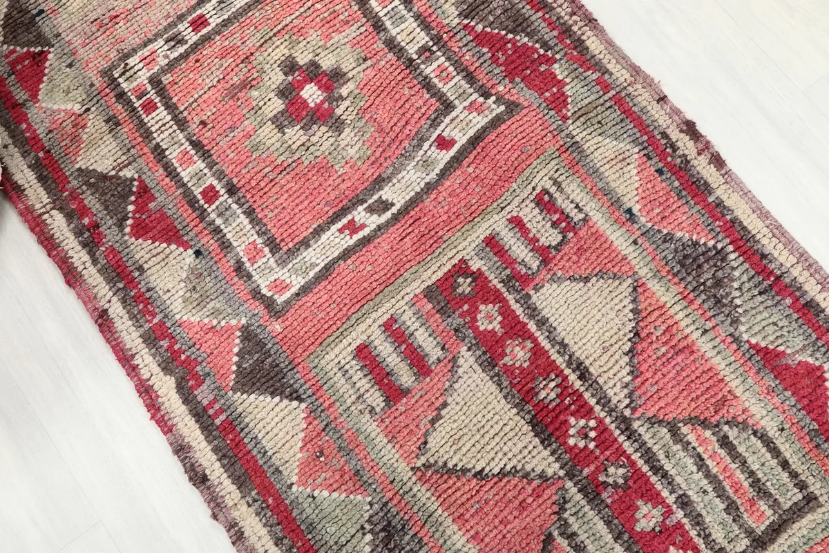 Overhead angle showing the intricate tribal and geometric patterns of the Anatolian runner