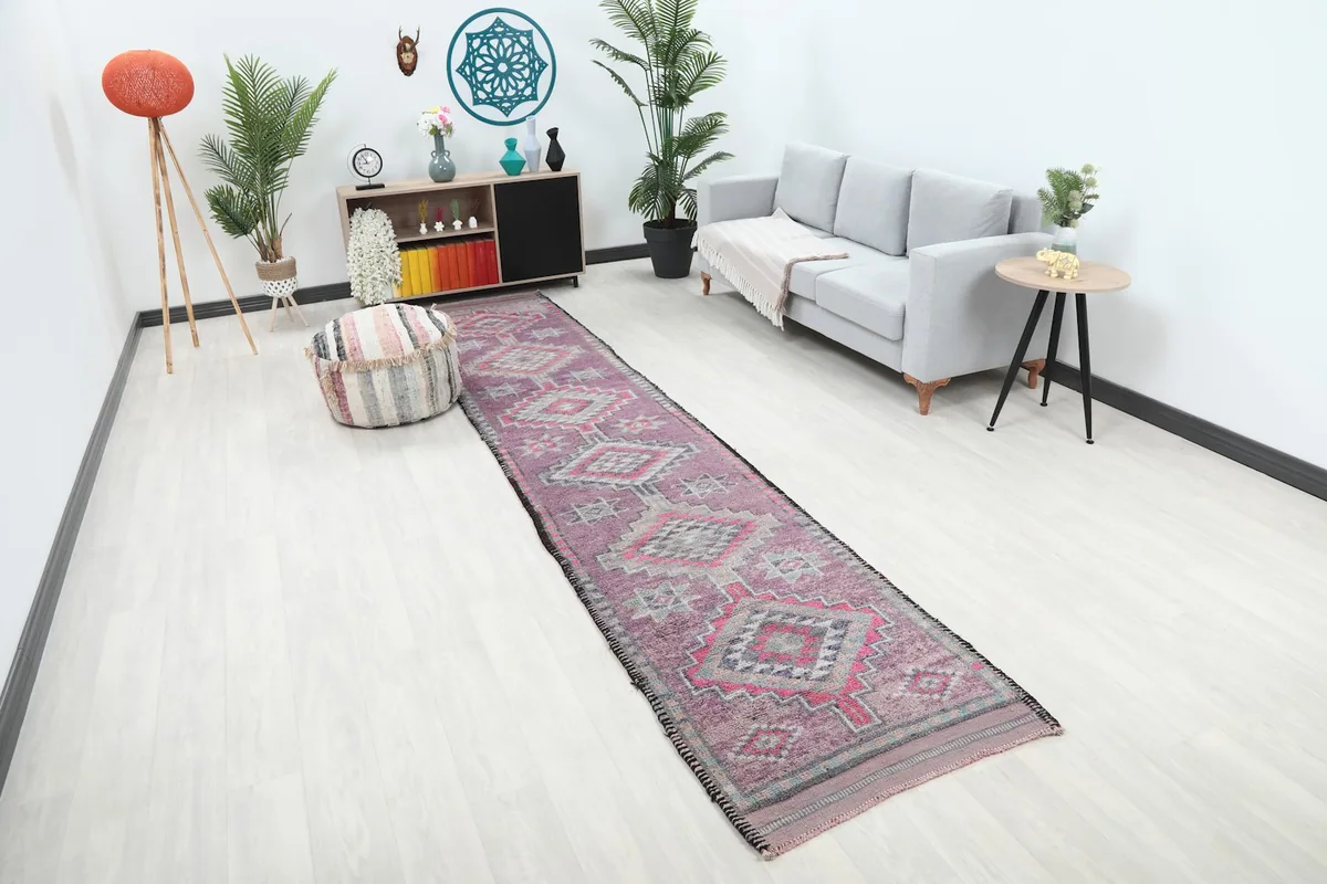 Long view of the rose runner rug in a contemporary living space from an elevated angle