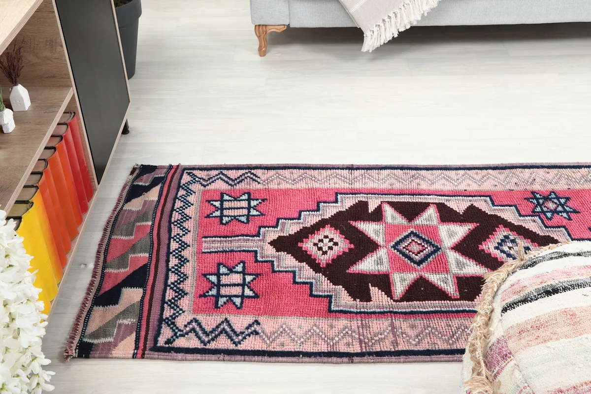 Angle view of the runner rug extending into a room, showing its placement