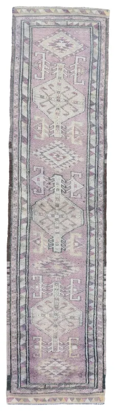 Full top view of the 2'10" x 11'11" vintage rose and gray geometric Anatolian runner rug