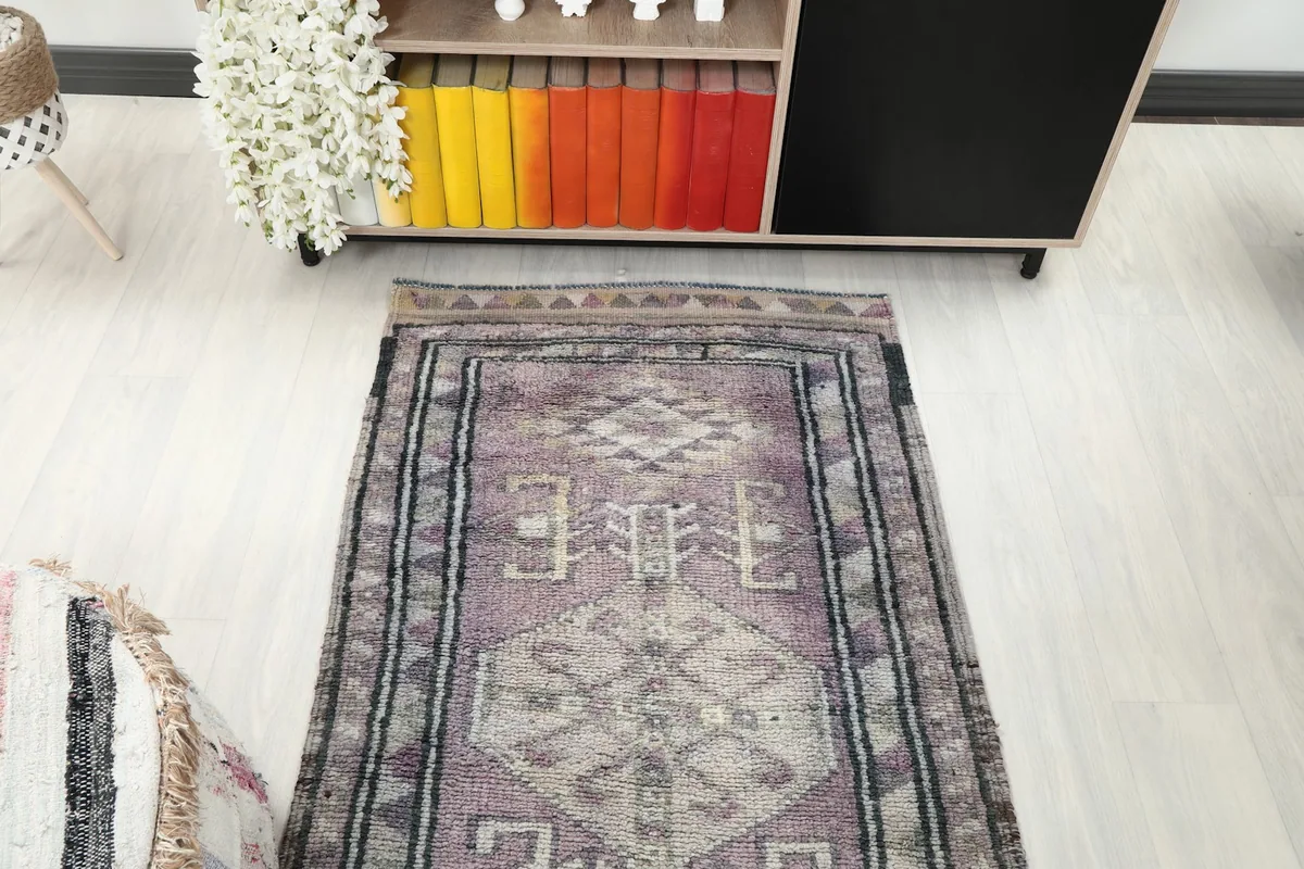 Overhead view of the runner's mid-section, displaying the repeating geometric patterns