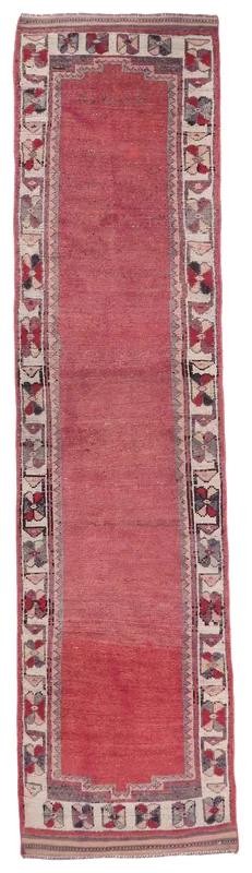 Full overhead view of the 2'11" x 12'6" vintage rose Anatolian runner rug