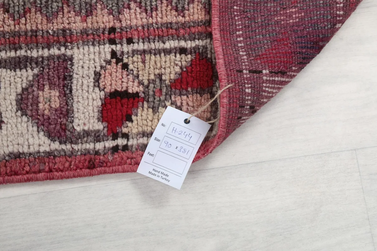 Corner of the rug with a size and product tag attached