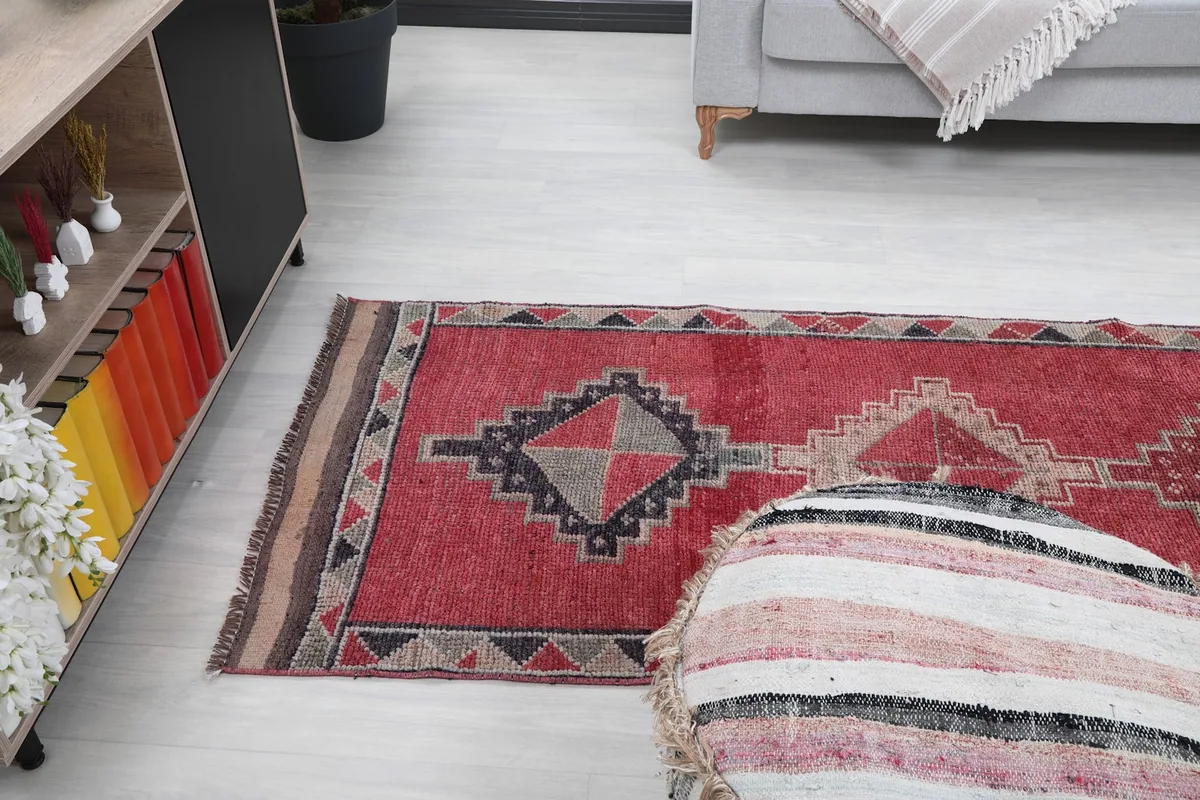 View of the runner rug stretching across a room, from a slightly elevated perspective