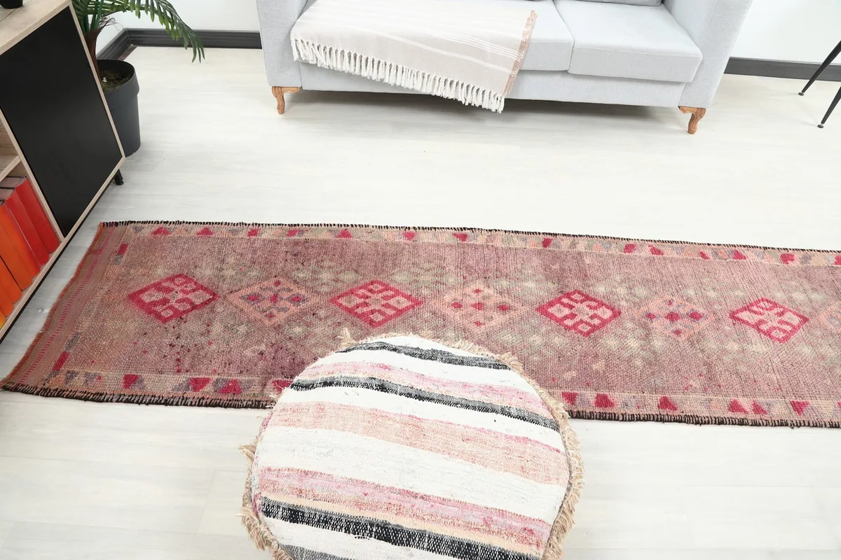 Full length of the runner in a room, offering a perspective on its scale and design