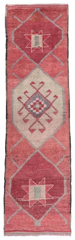 Full top view of the vintage rose geometric runner rug on a white background