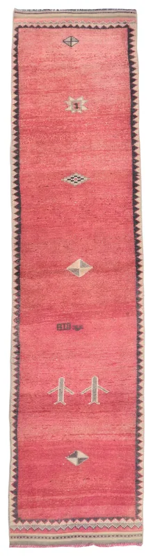 Full overhead view of the 2'11" x 12'10" rose tribal Anatolian runner rug on a white background.