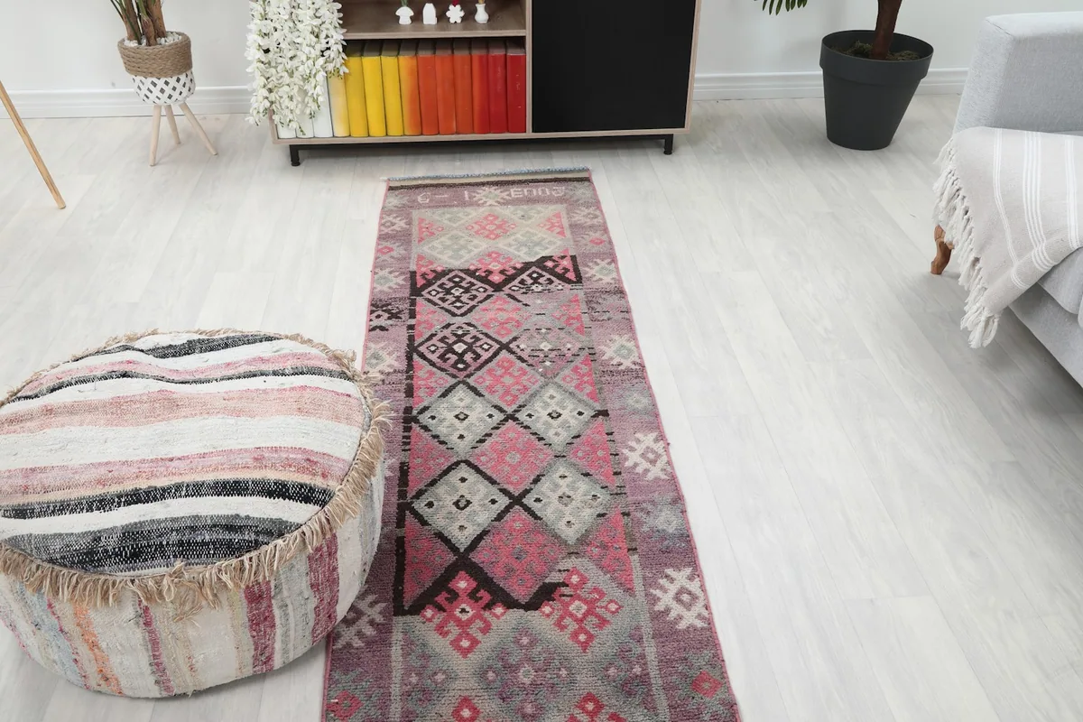 Overhead view of the runner rug in a room, capturing the full pattern from a higher perspective.
