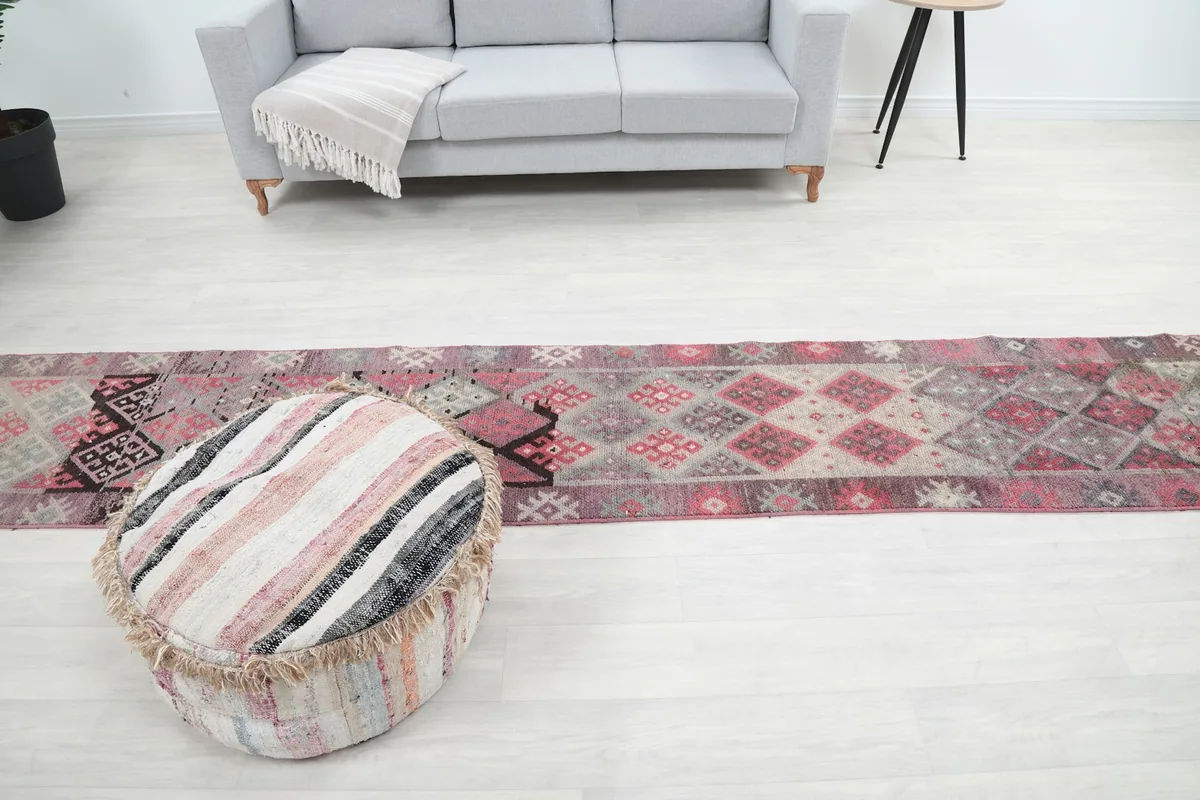 Wide shot of the room with the 2'2" x 13'6" runner rug, emphasizing its length and decorative impact.