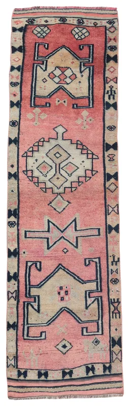 Full top view of the vintage rose and navy Anatolian runner rug with geometric patterns