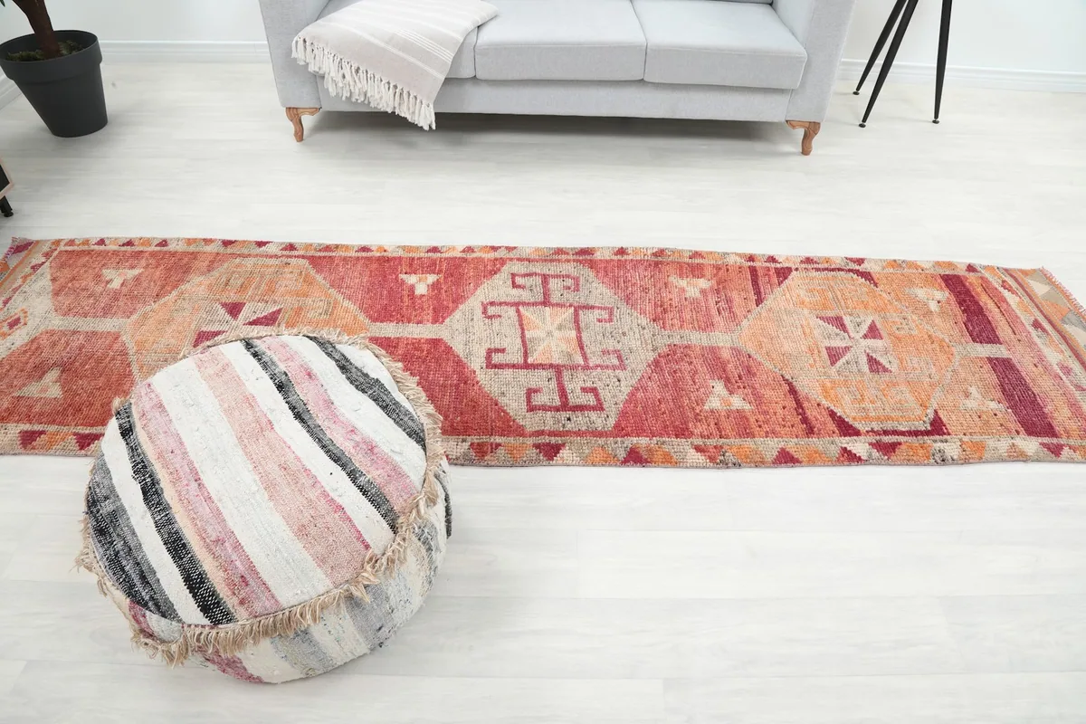 Wide shot of the runner rug in a room, highlighting its proportions