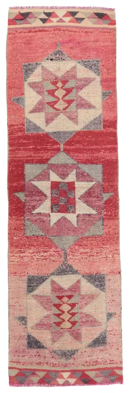 Full overhead view of the Red Pink Geometric Anatolian Runner on a white background
