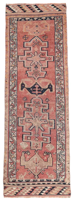 Full top view of the 3x10 vintage rust runner rug with geometric tribal patterns