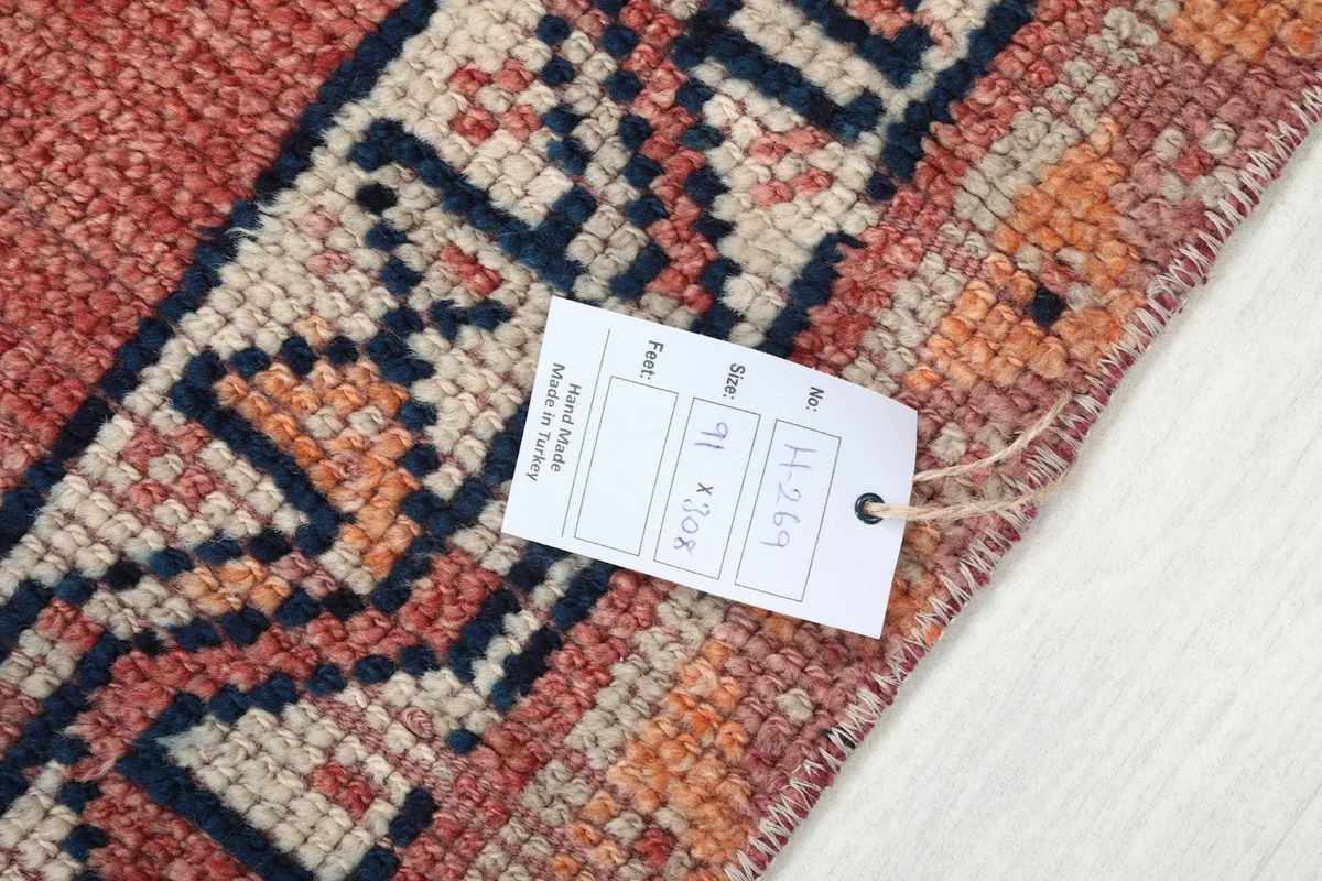 Product tag attached to the rug, displaying size and origin information
