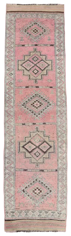 Full top view of the 2'11" x 11'5" vintage rose and beige geometric Anatolian runner rug
