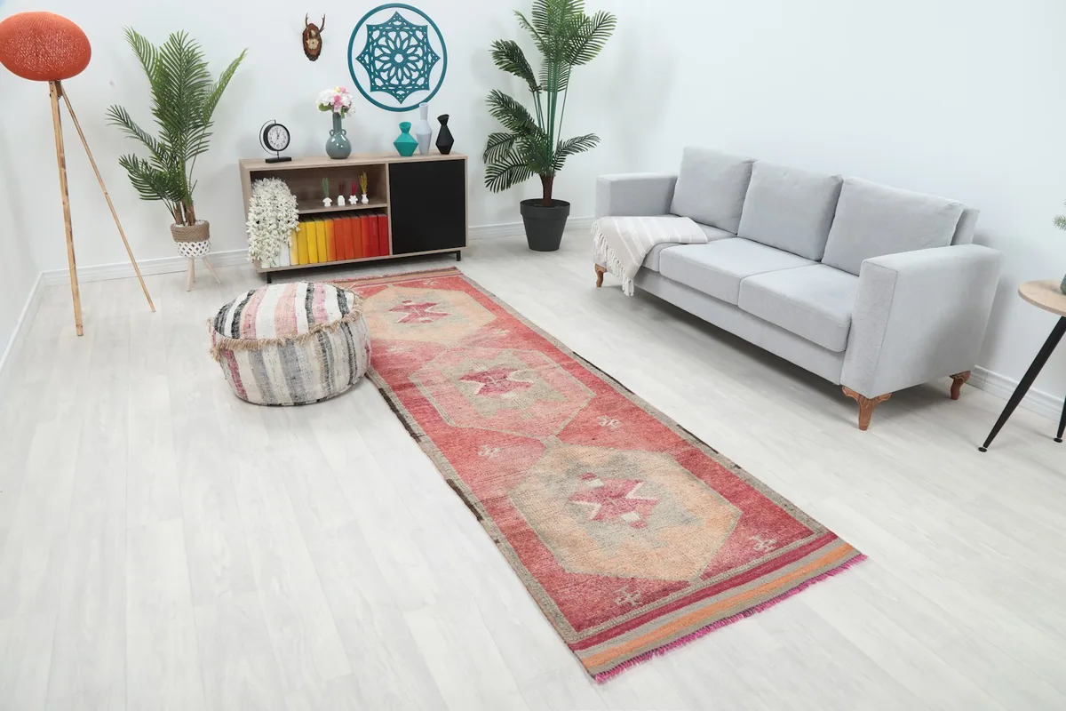 Angle view of the runner rug in a room, showing its length and how it complements the decor