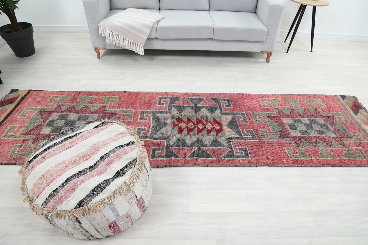Full length view of the runner in a room setting from a slightly elevated perspective