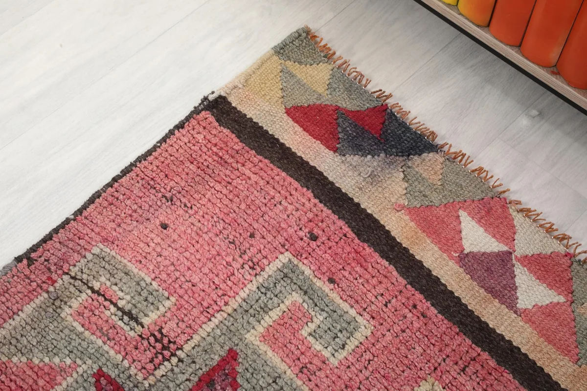 Detail of the border and end patterns of the vintage Anatolian runner