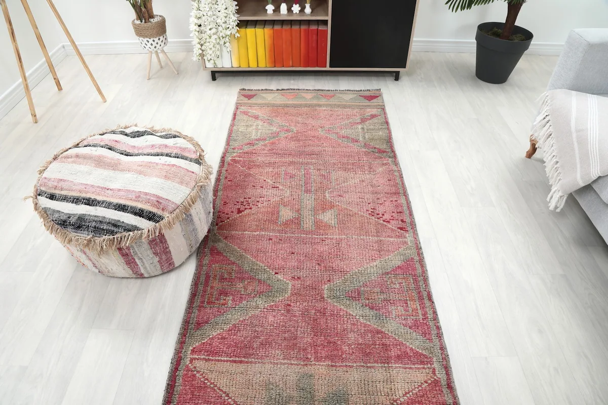 Overhead view of the runner rug in a styled room, emphasizing its length and decorative impact