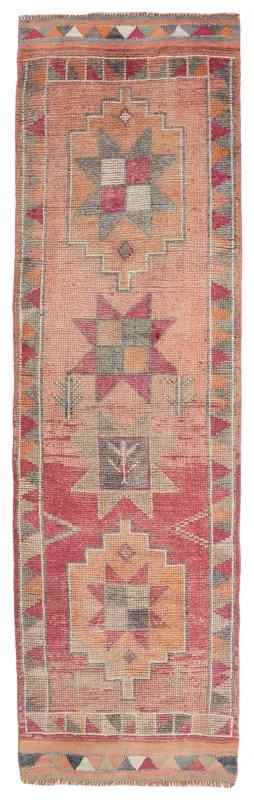 Full top view of the 2'11" x 10'9" rust red geometric vintage runner rug on a white background.
