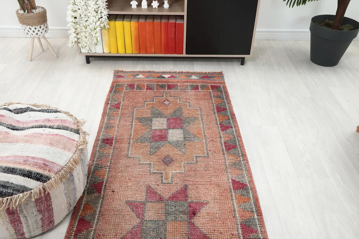Overhead view of the runner rug in a room, highlighting its length and design from above.
